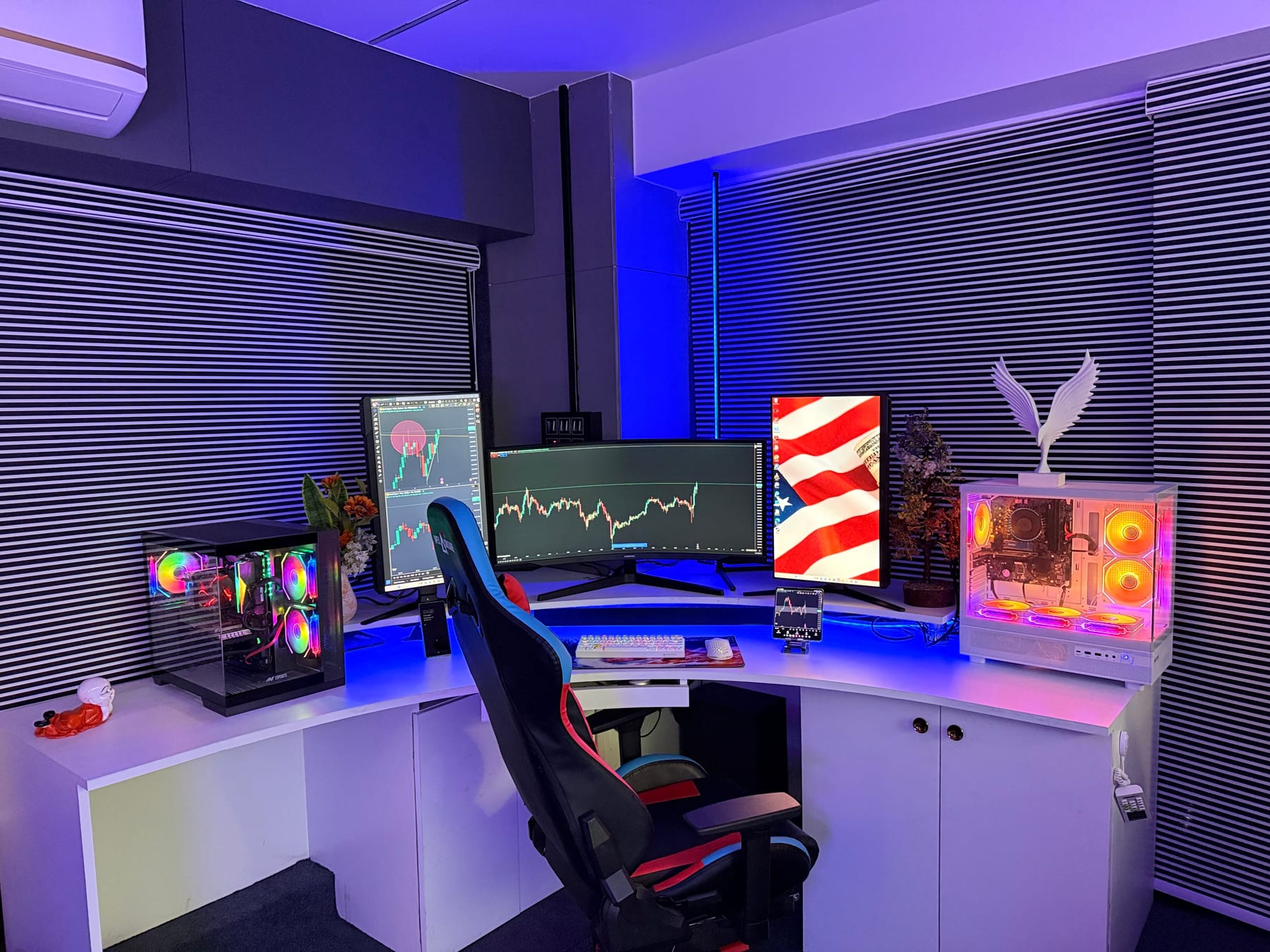 High-tech gaming setup with RGB lighting and three monitors